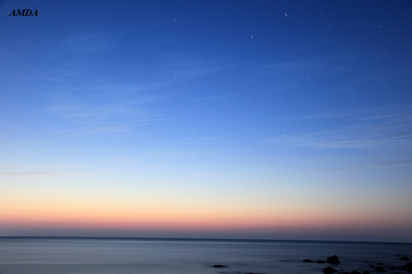 象潟町の夜景-日没後、水平線と夜空の星